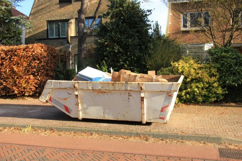 Before and after garden clearance in Thamesmead
